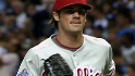 Hamels wins fourth in postseason