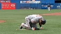 Roberts fouls a pitch off his leg