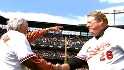 Brooks, Powell throw first pitch