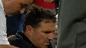 Umpire is hit by a pitch