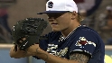 Latos strikes out seven