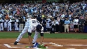 Mo lays flowers at the plate