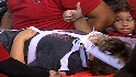 Fan hit by bat