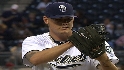 Latos strikes out 10