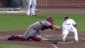 Scutaro throws out Reynolds