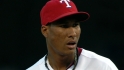Ogando's scoreless relief