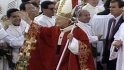 The largest crowd ever at Dodger Stadium sees the Pope perform mass