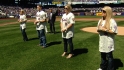 Carter family throws first pitch