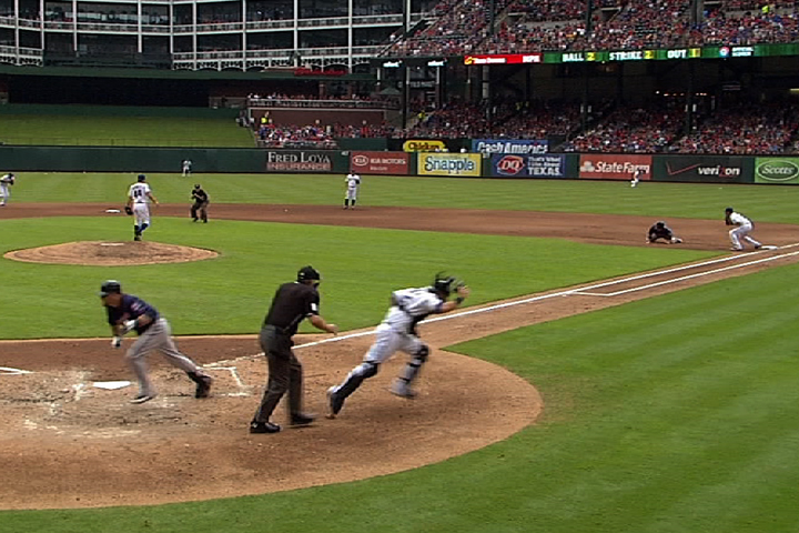 7/8/12: An unexpected thunder clap sends players and umpires running for cover during the fourth inning in Texas