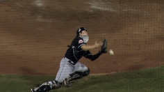 Phils hold off Fish, win sixth straight, return to .500