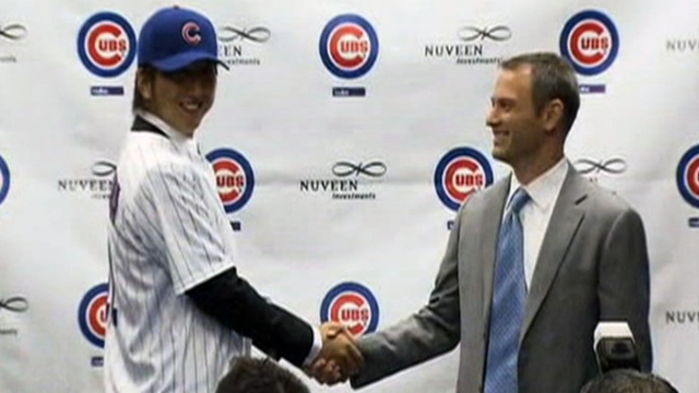 Fujikawa's transition begins as Cubs report to camp