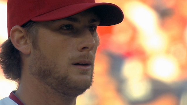 Moore drills two homers in back-and-forth victory