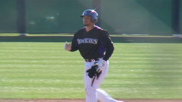 Rockies' pitching erratic in Helton's spring debut