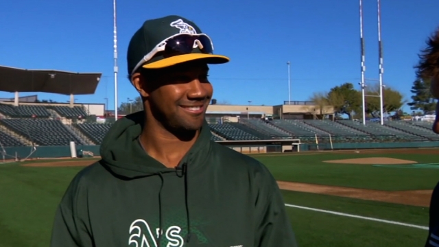 Colon solid, Young hits grand slam as A's top Brewers