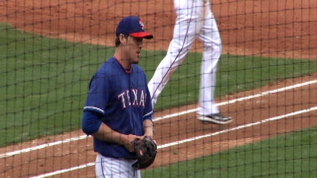 Nathan makes scoreless debut in Rangers' loss