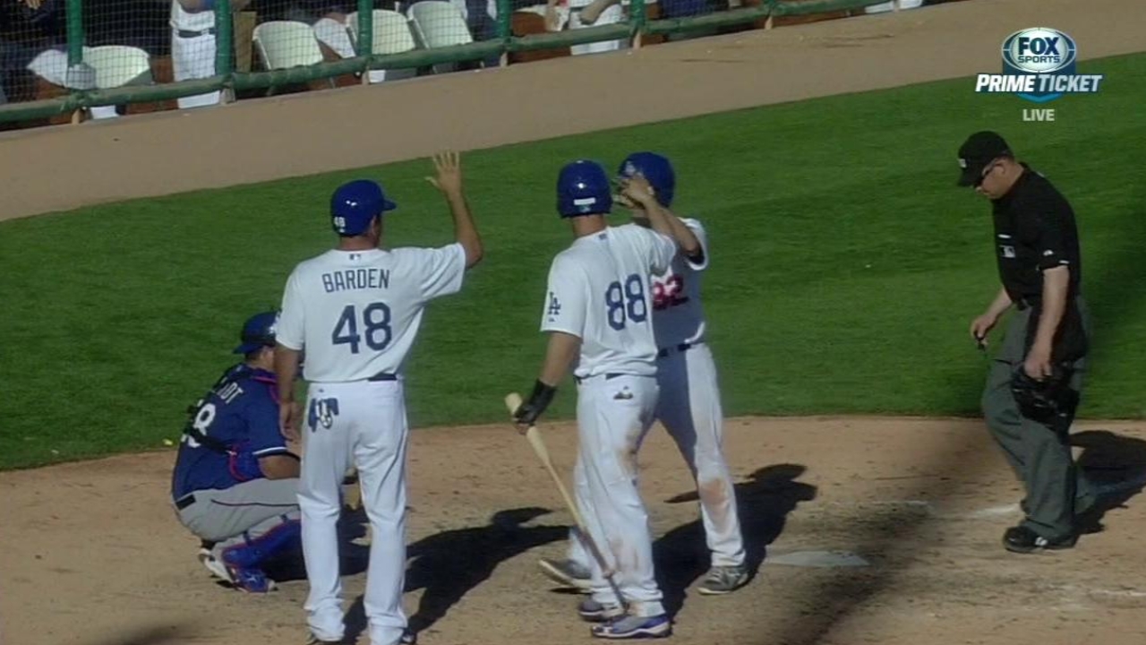 Angle's clutch blast in ninth forges tie for Dodgers