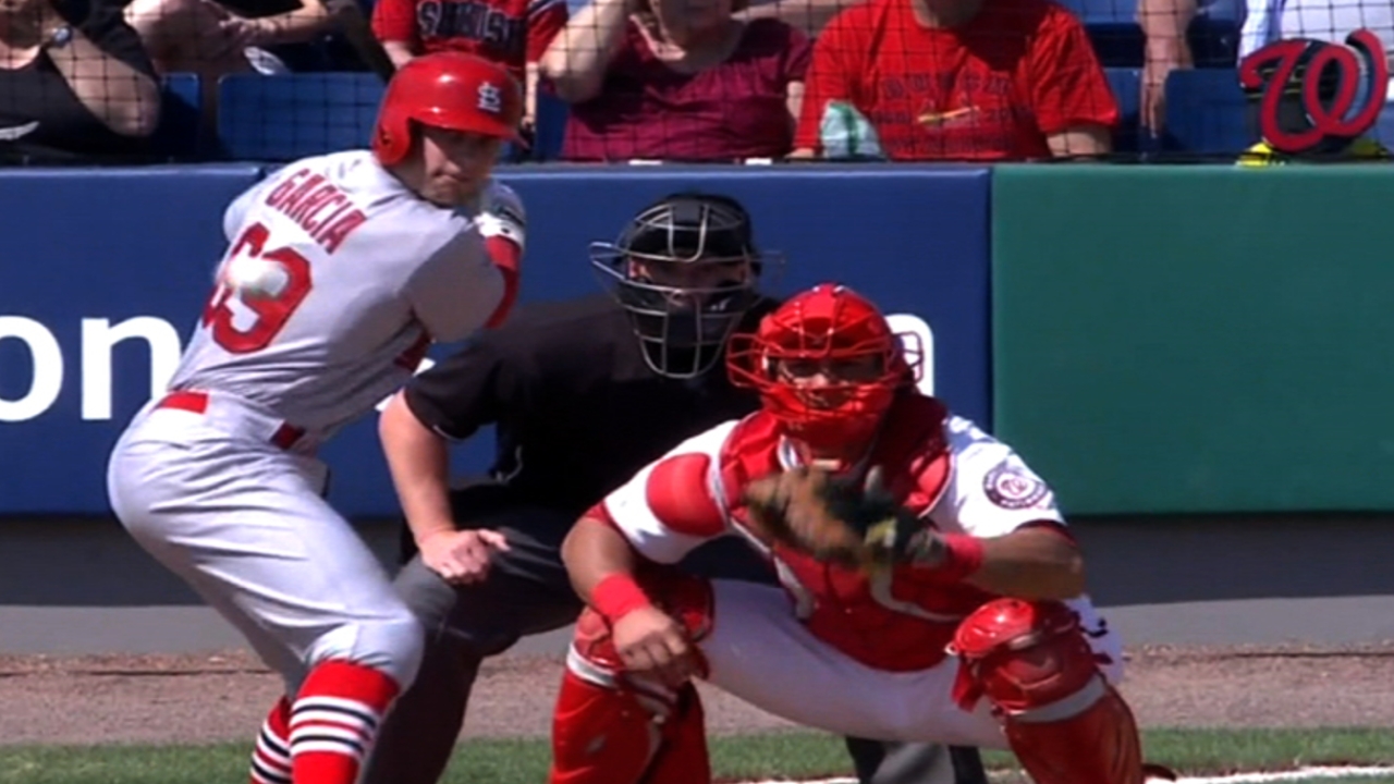 Robinson swats slam as Cards outslug Nationals