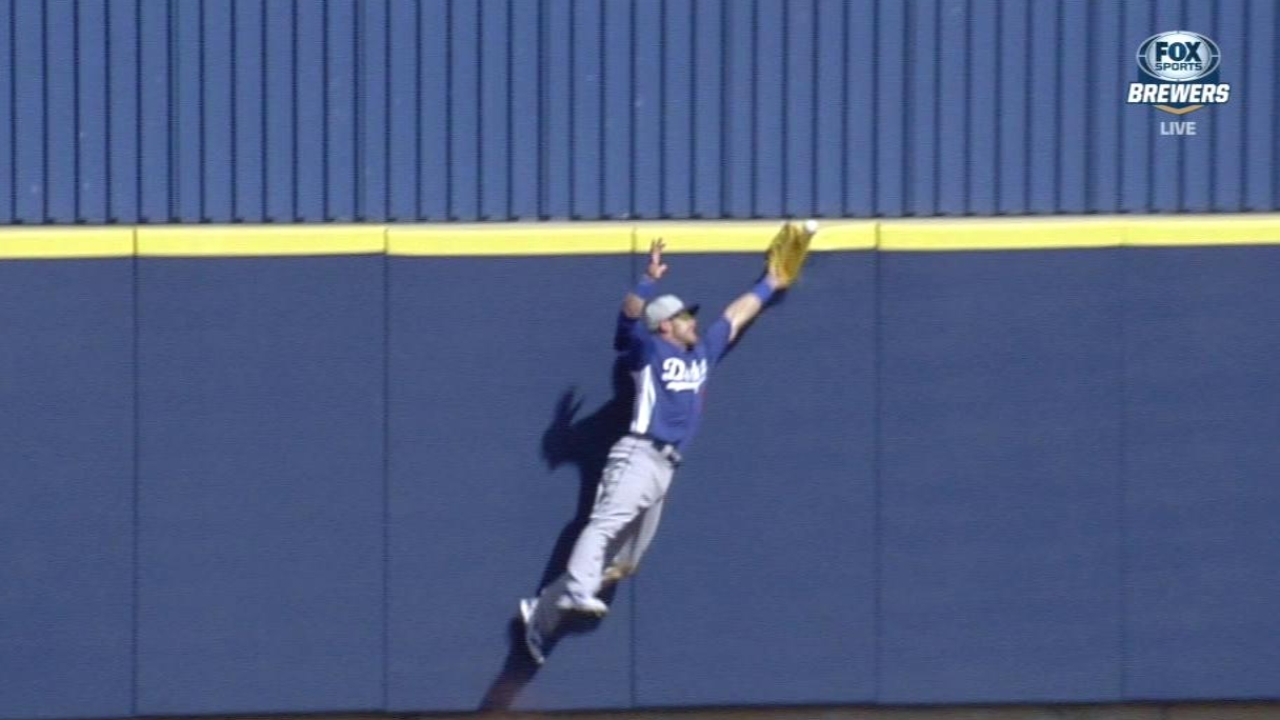 Weeks' RBI triple sparks Crew rally over Dodgers