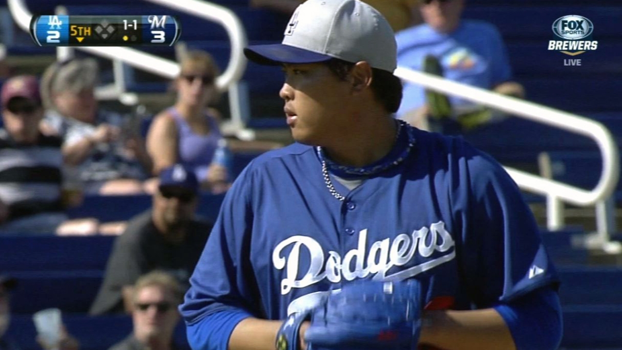 Ryu pitches into fifth after starting for Greinke
