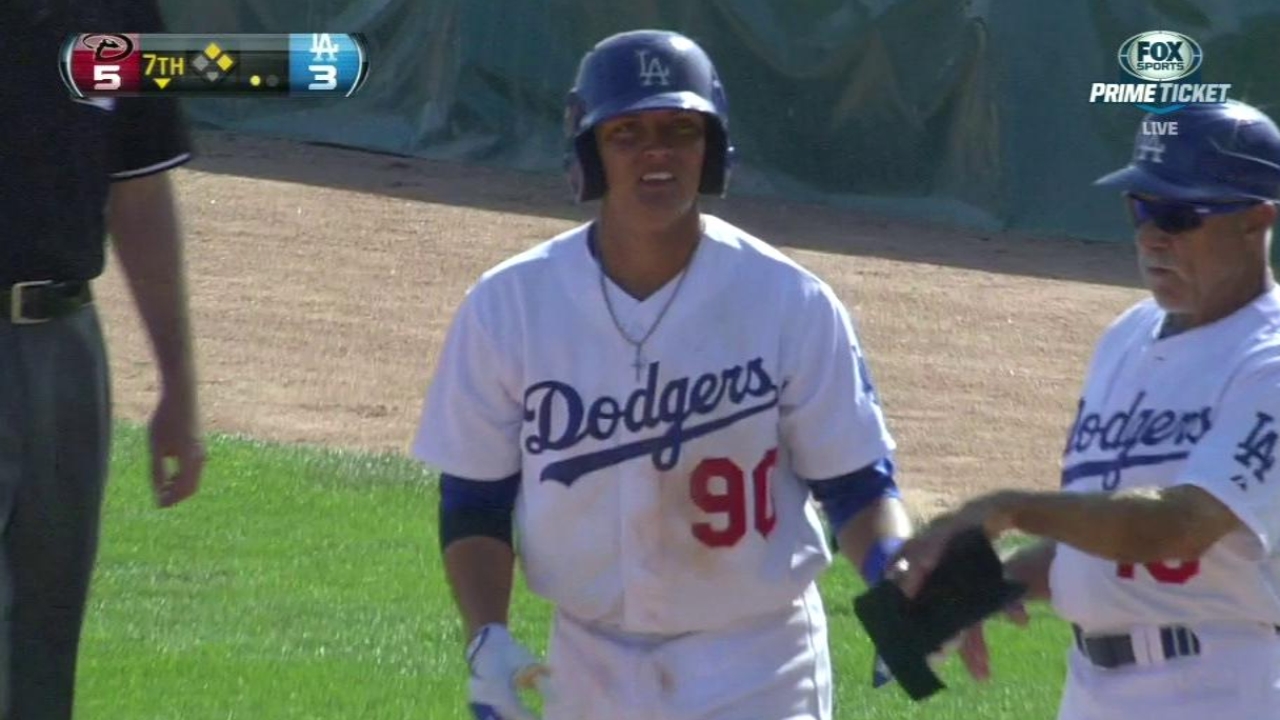 Rojas' glove keeps him in second-base mix