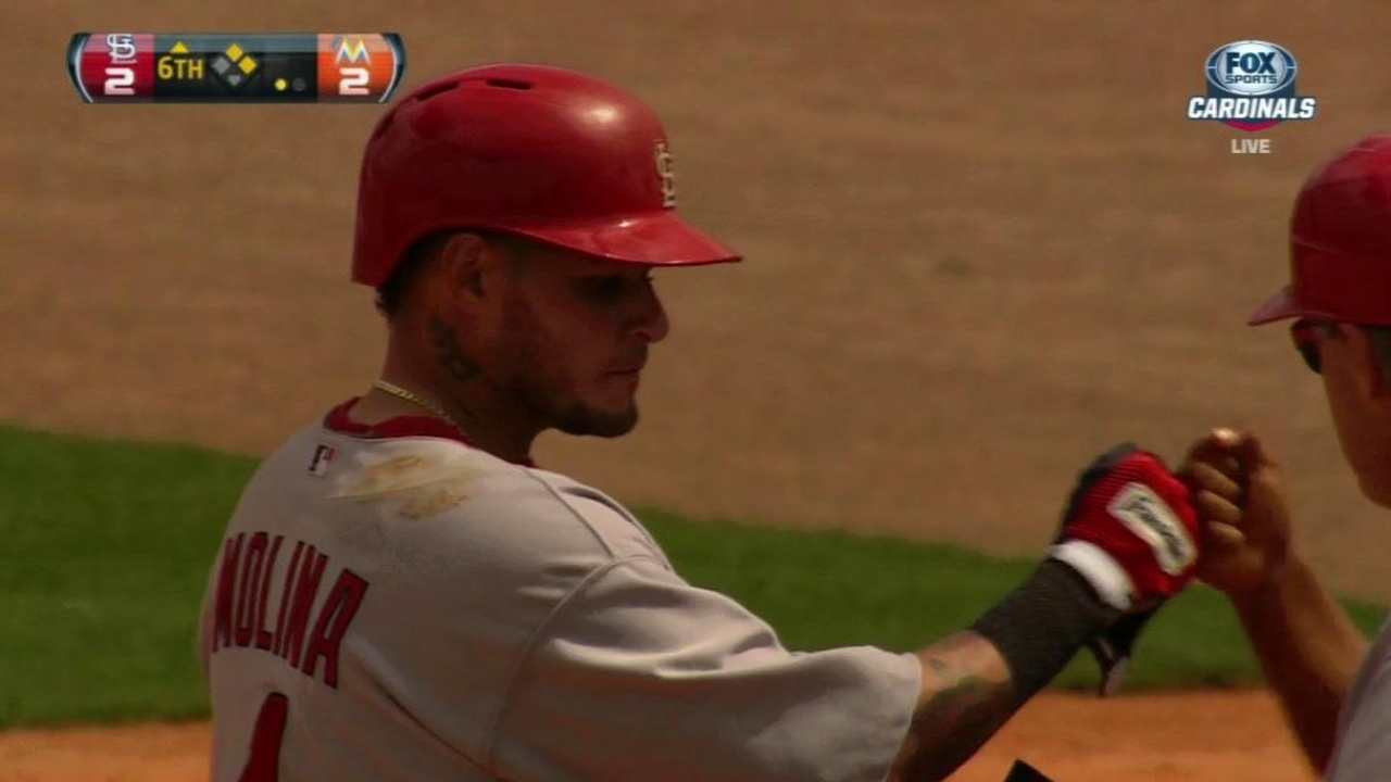 Lynn solid, Holliday puts Cards on board early in loss