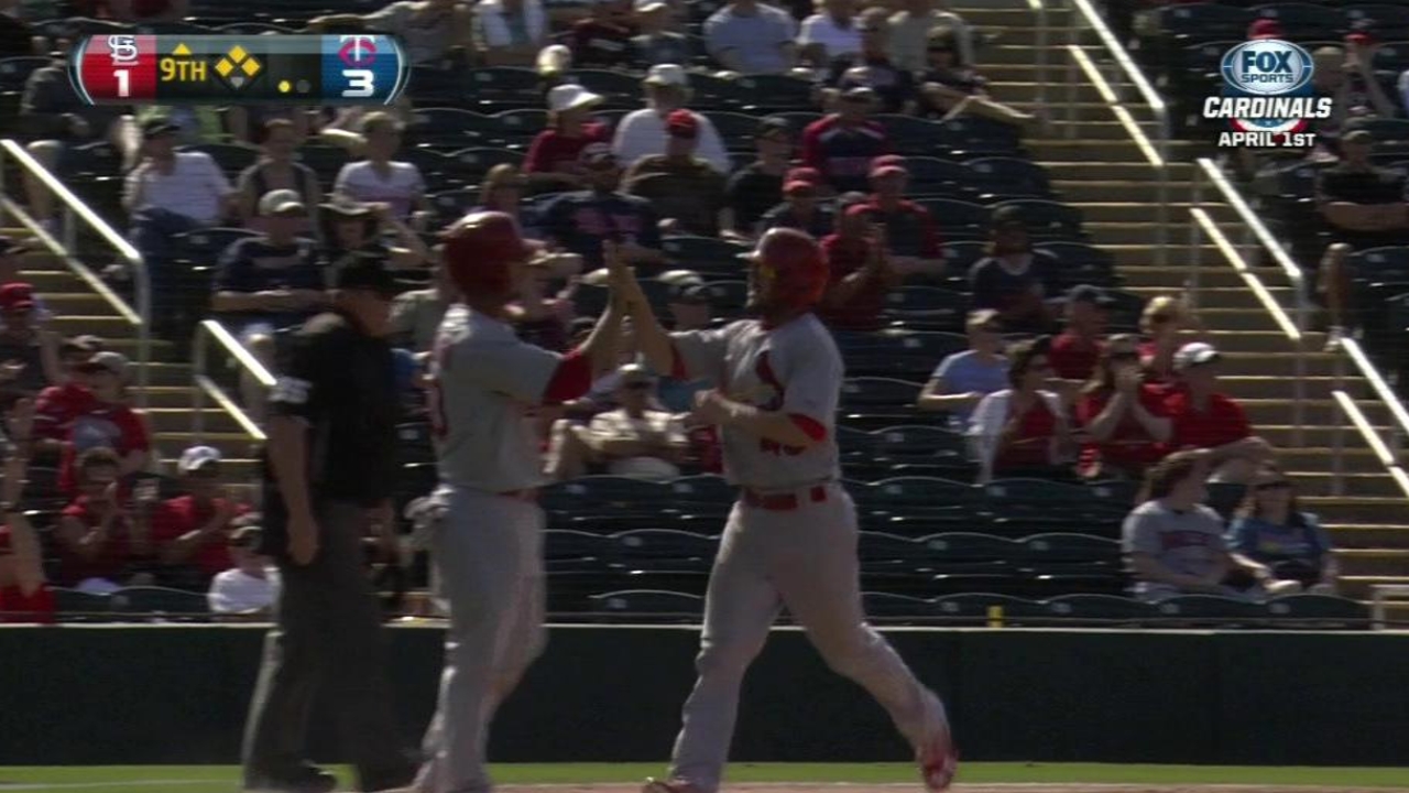Adams' three RBIs lift Cards to victory against Twins