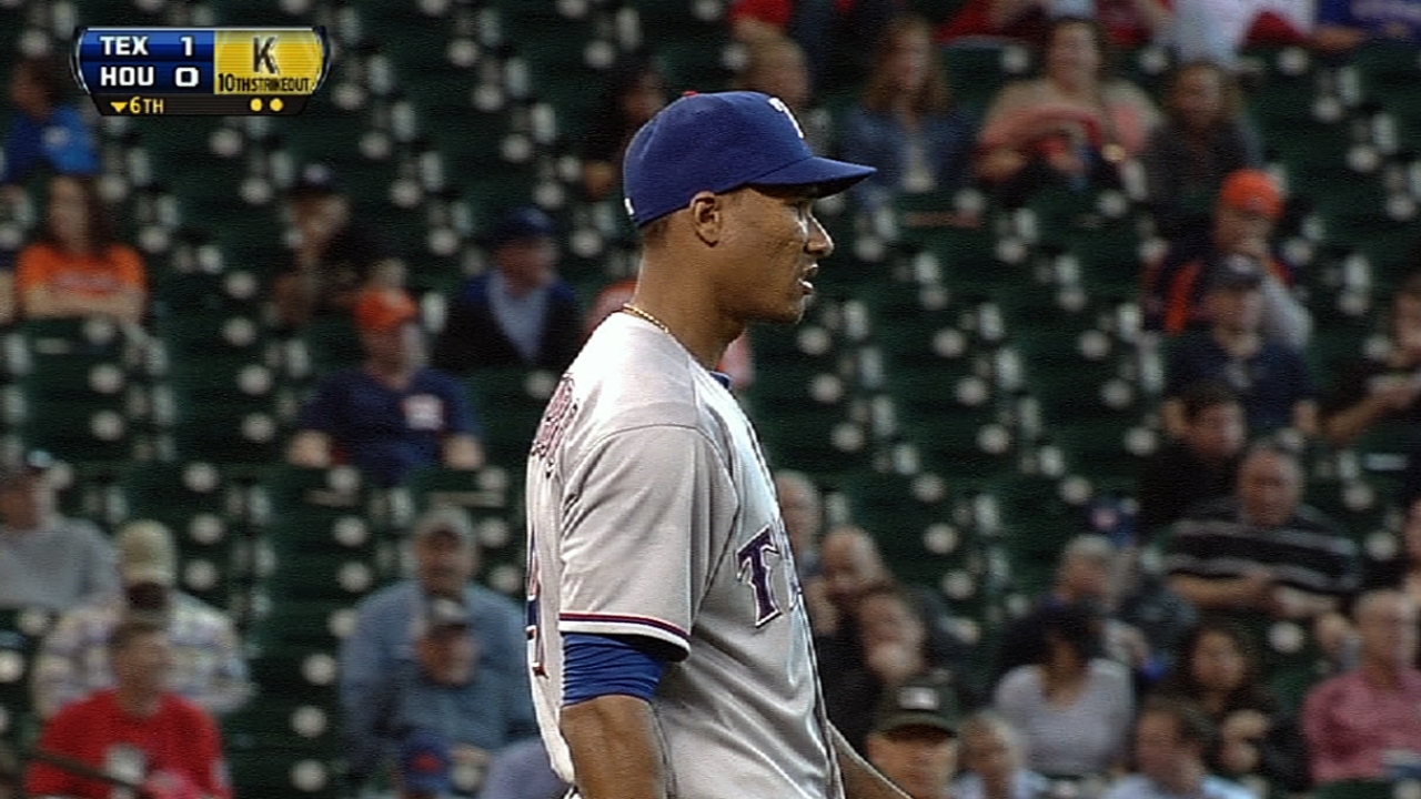 Ogando helps Rangers set K mark in victory