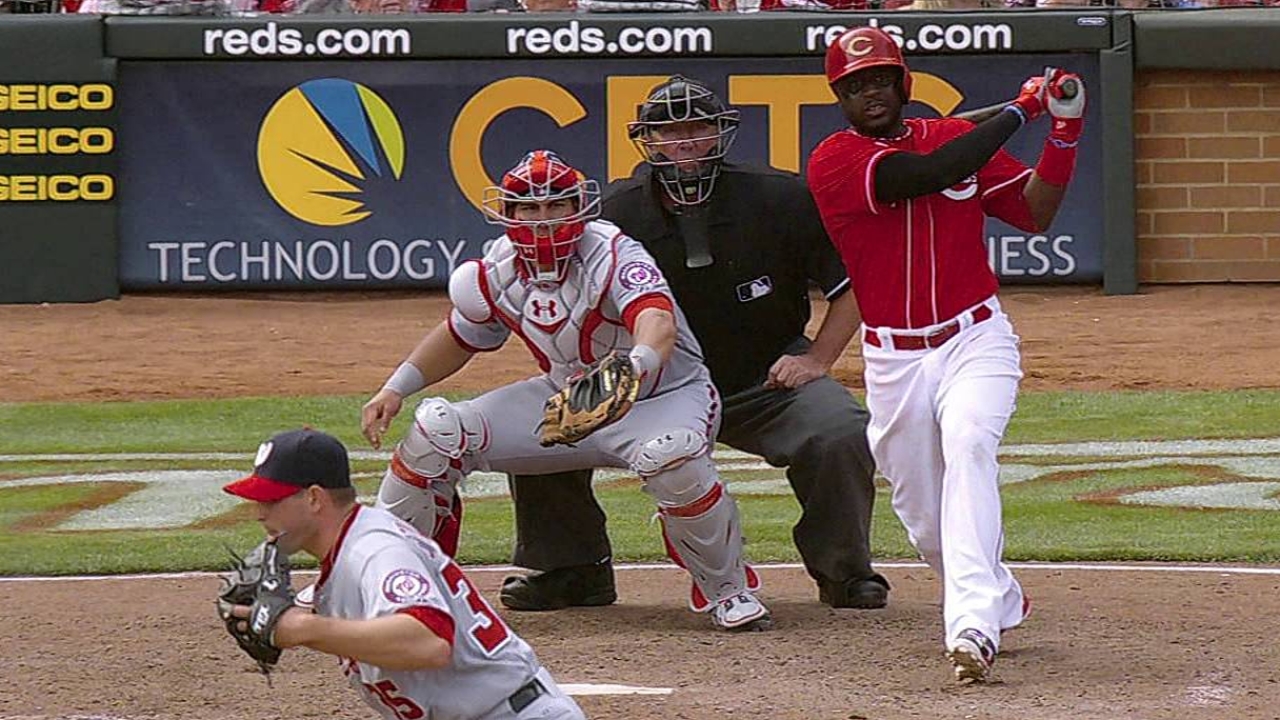 Reds miss opportunities in extra-innings loss