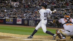 Masterful Kuroda gets help from Gardner's bat