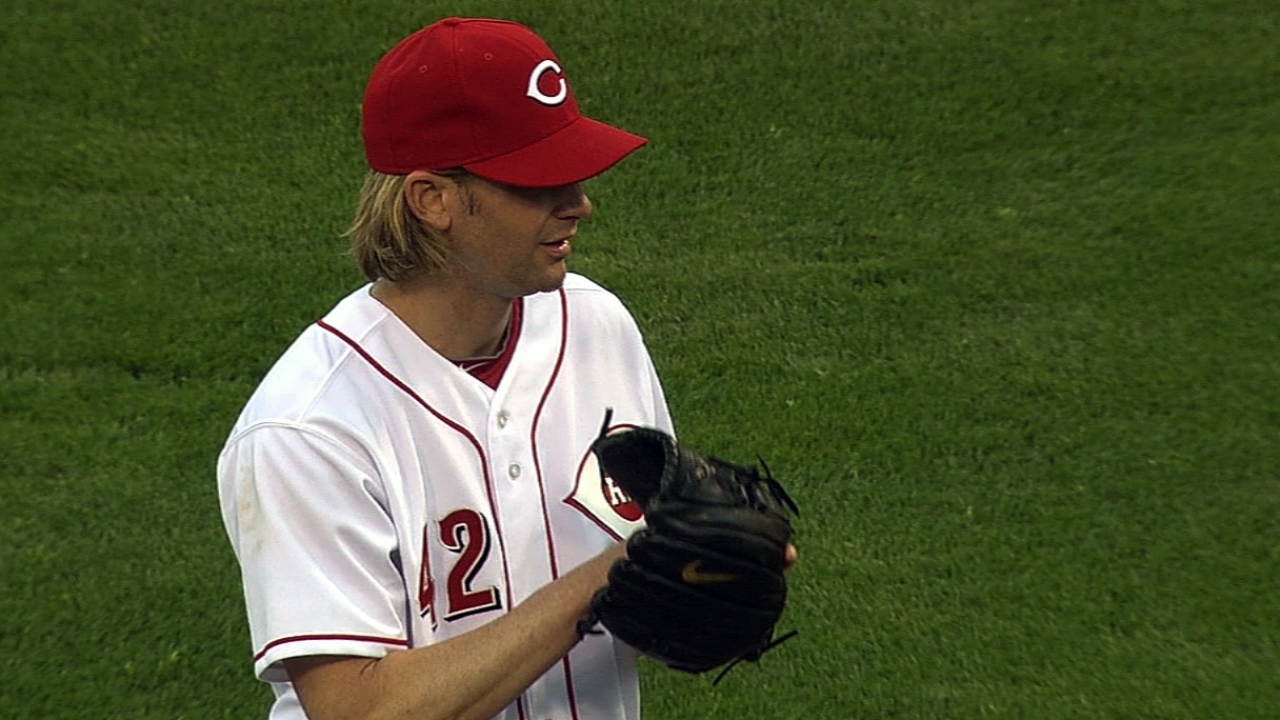 Phillips backs Arroyo with clutch hit on special day