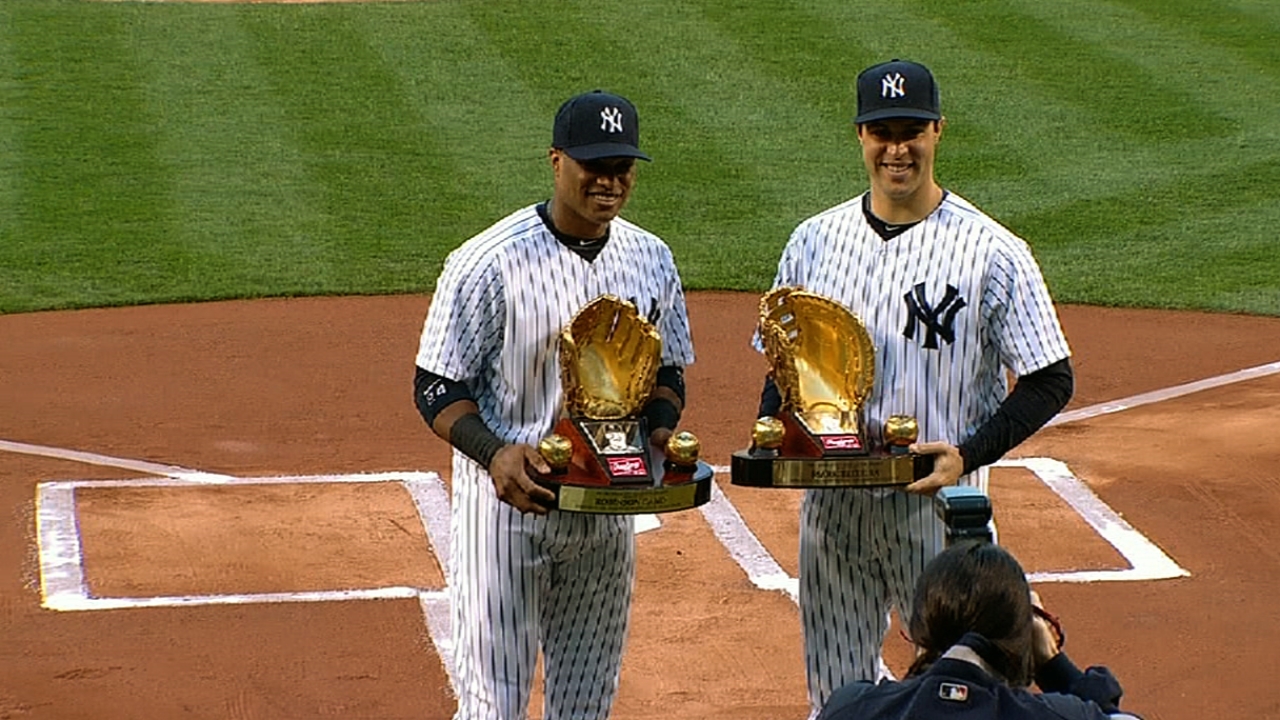Cano, Tex receive Gold Glove Awards