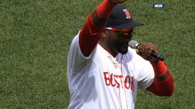 Bombing victim Daniel delivers game ball to mound