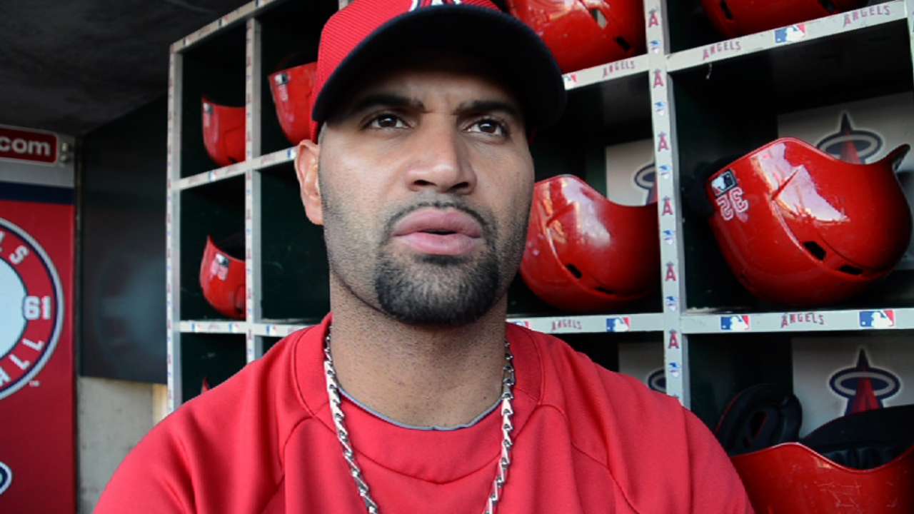 Pujols returns to first base