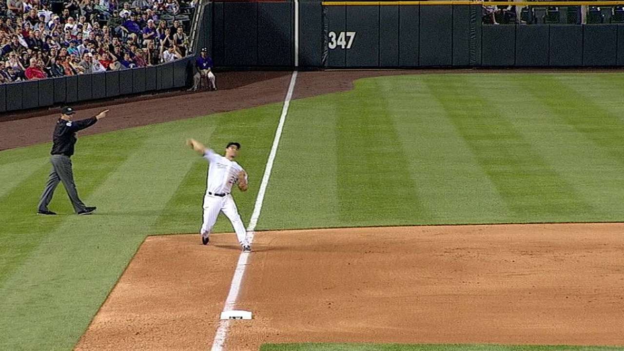 Rockies come out slugging, see lead slip away