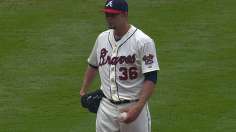Delayed start, but Braves rally late again to sweep