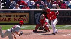 Strasburg's sparkling outing bests Hamels, Phillies