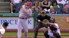 Reds roll in opener vs. Bucs behind dominant Cueto