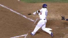Puig punctuates Greinke's gem with first slam