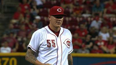Latos tough on Cards, but Reds will need more