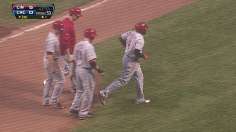 Phillips' slam lifts Reds amid heavy fog at Wrigley
