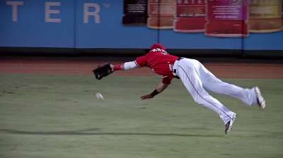 Martin injures wrist diving for ball; X-rays negative