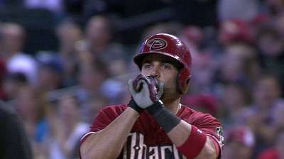 D-backs limited by Latos in series-ending loss