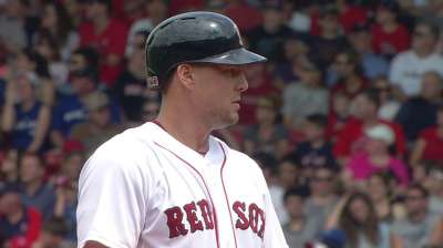 Lind exits game against Red Sox with back tightness