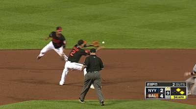Johnson records 100th save in O's victory