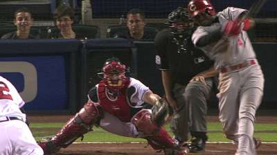 Latos can't curtail Reds' road woes