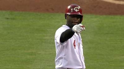 Reds break out, withstand rally to prevail over Pirates