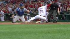 Greinke wins duel with bat, arm to extend road streak