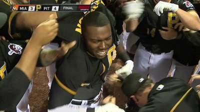 Harrison's heroics give Bucs walk-off win in opener