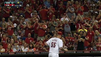 Latos shuts down A's with escape-artist performance