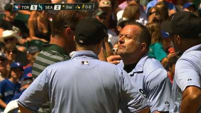 Umpire Scott leaves after face mask hit by foul ball